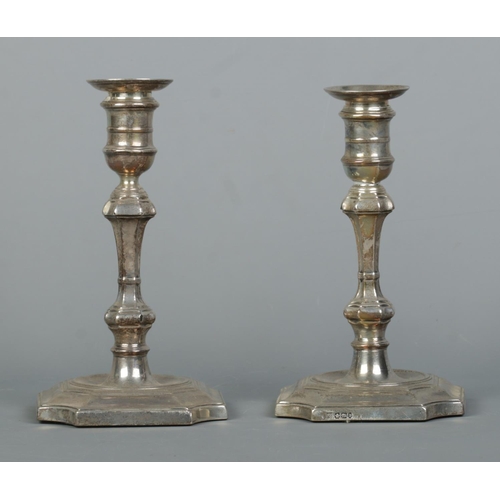 90 - A pair of silver candlesticks with detachable nozzles. Assayed for Sheffield with date marks for 190... 