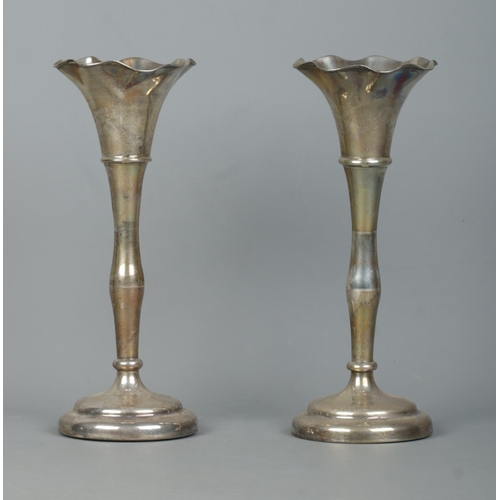 94 - A pair of early 20th century silver vases. Both bearing monograms for WH SH. Makers mark for James D... 