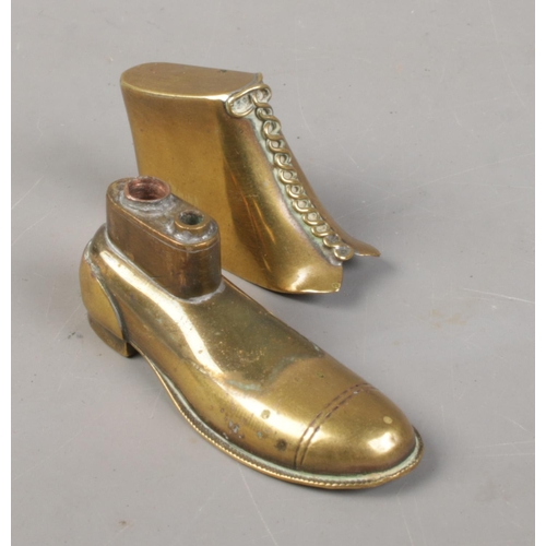 527 - A brass novelty lighter in the form of a boot.