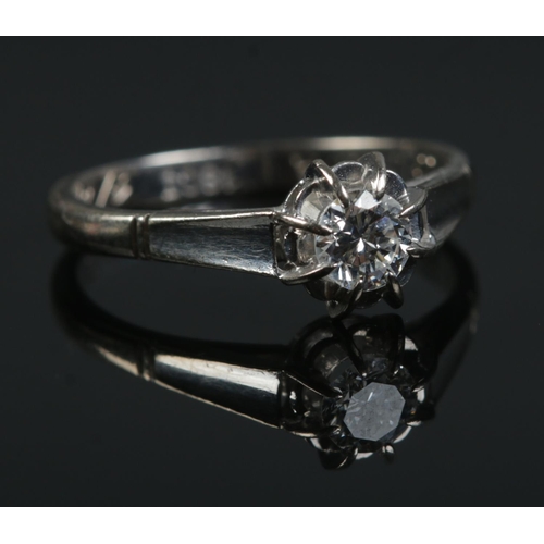 532 - An 18ct white gold diamond solitaire ring. Size K 1/2. 2.92g.