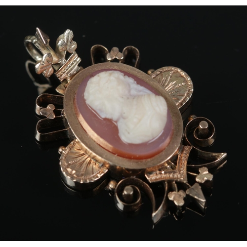 533 - A 19th century gold and hardstone cameo pendant. Tests as 9ct. 3.4g.