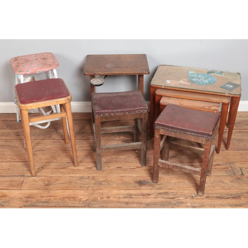 569 - A small quantity of furniture. Includes oak smokers side table, pair of stools, etc.