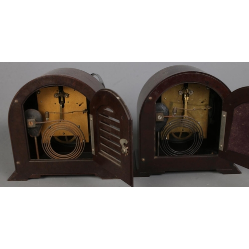 352 - Two Smiths Enfield bakelite cased mantle clocks along with a small collection of clock spares and re... 