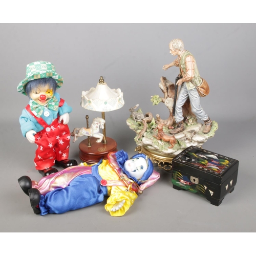 354 - A quantity of musical collectables and figures to include Capodimonte figure, oriental jewellery box... 