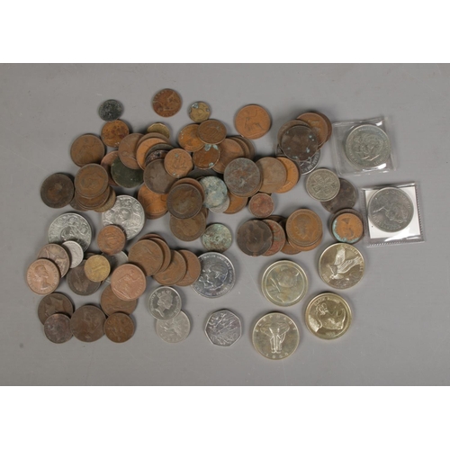 366 - A collection of assorted circulated and commemorative coins to include crowns, world savers, pennies... 