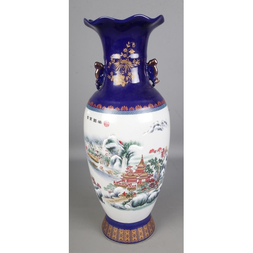 368 - A large Japanese Floor vase painted with oriental winter scenes.

Hx59cm