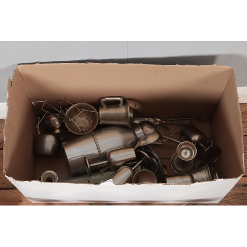 405 - A box of metalwares. Includes tankards, trays, cased flatwares, drinking vessels, etc.