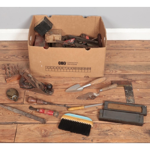 441 - A box of tools. Includes Stanley plane, trowel, screwdrivers, etc.