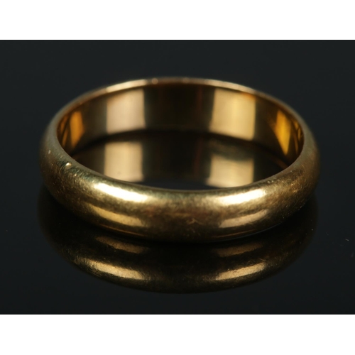 494 - A 22ct gold wedding band. 4.91g