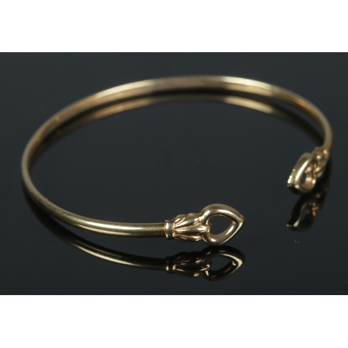 496 - A 9ct gold bangle. 3.49g