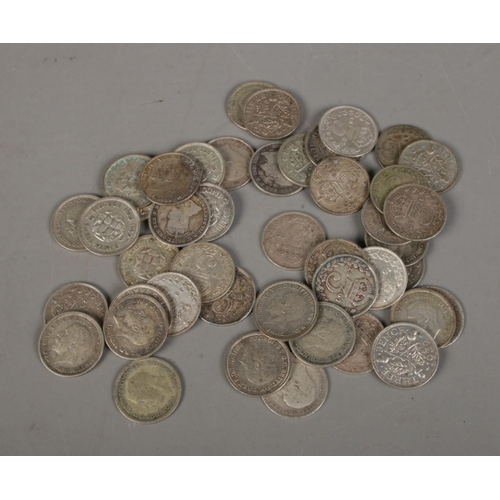 519 - A quantity of pre and post 1920 three pence silver coins,  61.8g