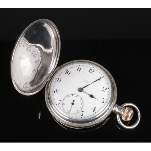 520 - A silver cased full hunter pocket watch, having enamel dial with subsidiary seconds dial by Rattray ... 