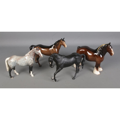 552 - Four Beswick ceramic horses to include Strawberry Roan, Black Betty, Shire and Swish examples.