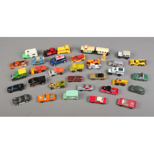 333 - A collection of diecast vehicles including Matchbox and Corgi examples.