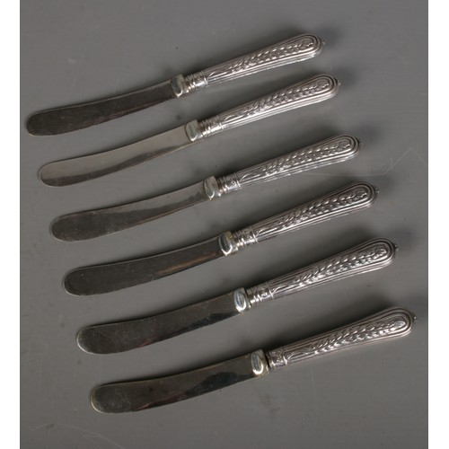 544 - A set of six Edwardian silver handled tea knives assayed Sheffield 1909.