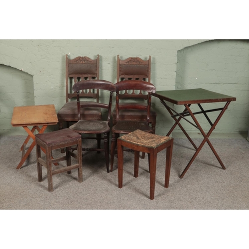 600 - A collection of assorted furniture to include two pairs of dining chairs, two stools and two folding... 