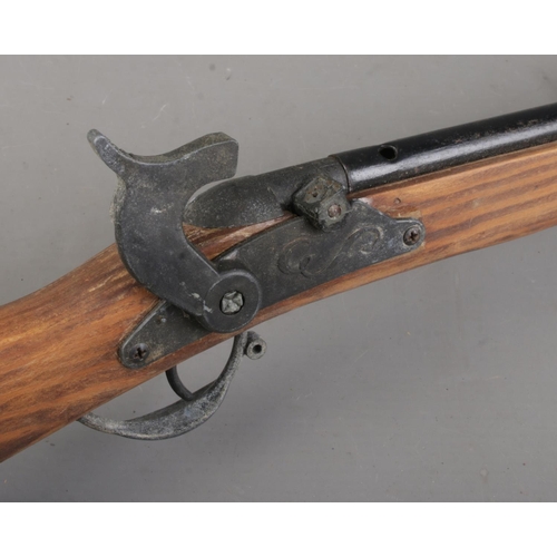 109 - A wooden replica 1776 Freedom Rifle. Length 94cm. CANNOT POST.