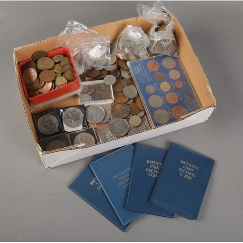 135 - A tray of mainly British pre decimal coins. Includes commemorative, half pennies, Britain's First De... 