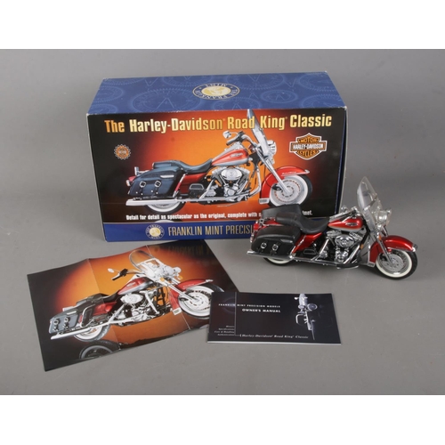 147 - A boxed Franklin Mint 1:10 scale diecast model of The Harley Davidson Road King Classic.