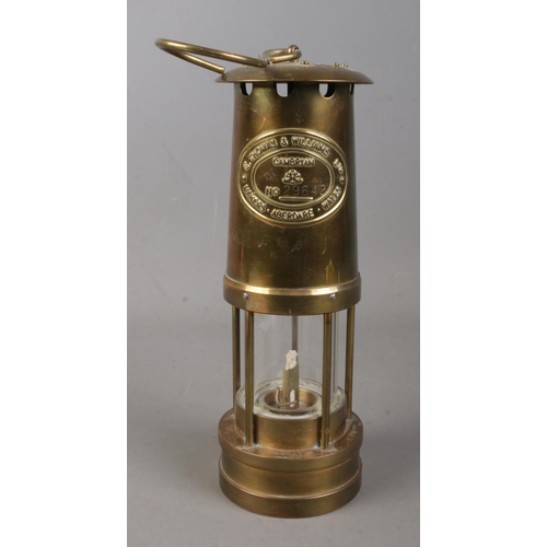 152 - A Welsh brass miners lamp by E Thomas & Williams Ltd.