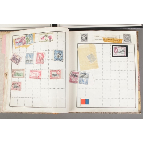 162 - A book of international stamps along with The Westminster Collection folder containing The Monarchs ... 