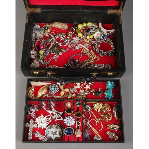 170 - A jewellery case with contents of costume jewellery. Includes brooches, pendants, earrings, chains e... 