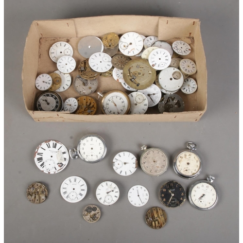 182 - A box of assorted pocket watch spares and movements to include Ingersoll, Smiths, Weir and Sons, Ben... 