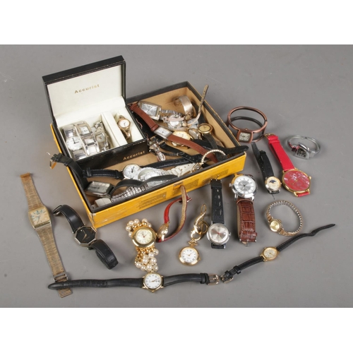 188 - A box of ladies and gents quartz and manual wristwatches. Includes Sekonda, Lorus, Timex etc.