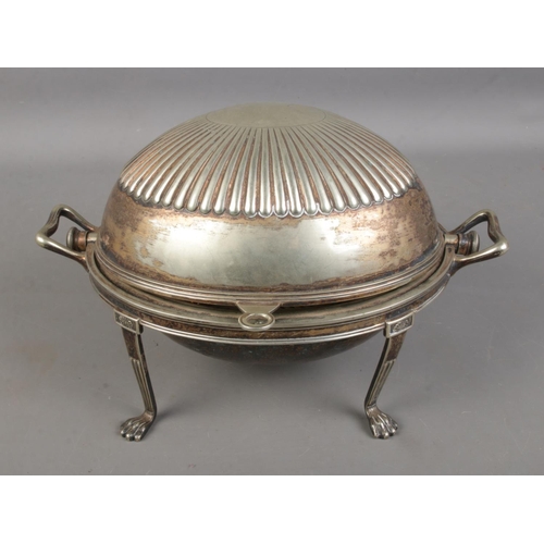 197 - A silver plated roll-top chafing dish raised on lion paw feet by M&H Co.