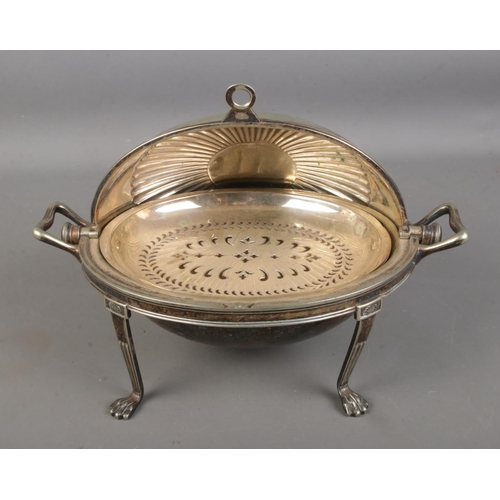 197 - A silver plated roll-top chafing dish raised on lion paw feet by M&H Co.