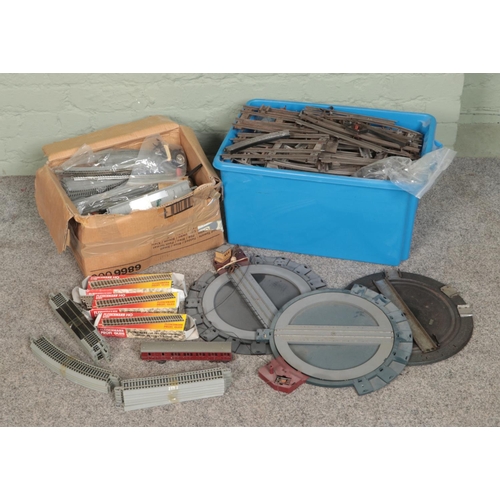 203 - Two boxes of assorted model railway track and accessories to include O Gauge, OO Gauge, Turntables, ... 