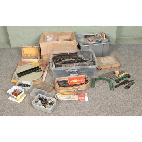 204 - Three boxes of assorted model railway spares and repairs to include Hornby, Tri-Ang, Trix Twin Railw... 