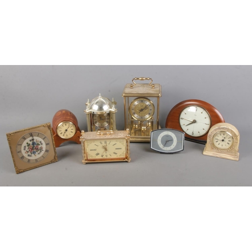 206 - A collection of assorted clocks to include Metamec, Slava, Aynsley, Enfield, etc.