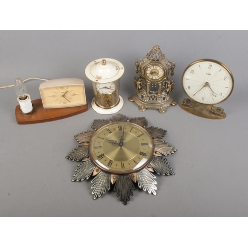 207 - A collection of assorted clocks to include Metamec sunburst wall clock, Smiths 8 Day Floating Balanc... 