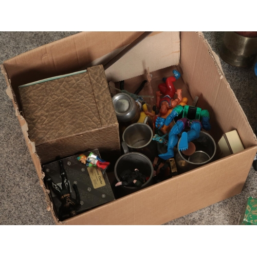 215 - A box of miscellaneous to include action figures, Slazenger tennis balls, silver plate, scratch buil... 