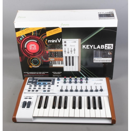 220 - A boxed Arturia Keylab 25 Midi controller keyboard.