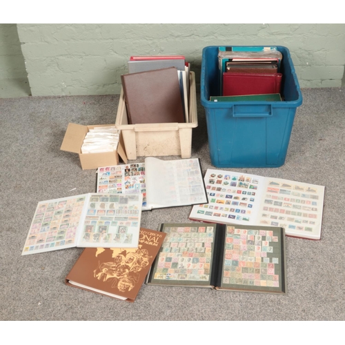 221 - Two boxes of assorted international stamp albums both complete and partially complete. Includes Cana... 