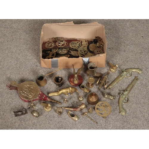 274 - A box of metalwares. Mainly brass items to include fox, boots, bronze pestle and mortar, cannon etc.