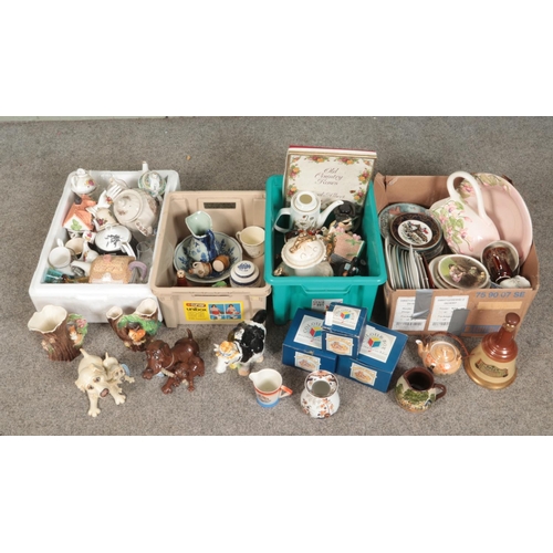 279 - Four boxes of miscellaneous. Includes Pets With Personality figures, novelty teapots, Hornsea, cabin... 