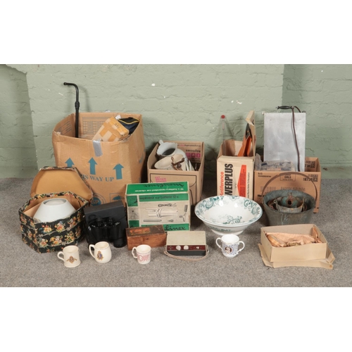 282 - Four boxes of miscellaneous to include Gold State Coach lead figure, ceramics, jam pan, etc.