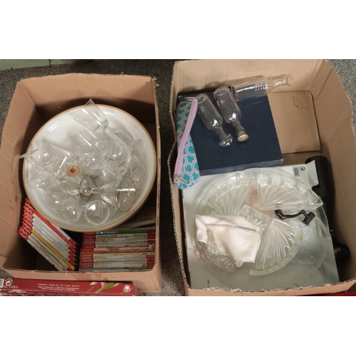 310 - Two boxes of miscellaneous to include Babycham glasses, Ladybird Books, sealed alcohol, ceramics, et... 