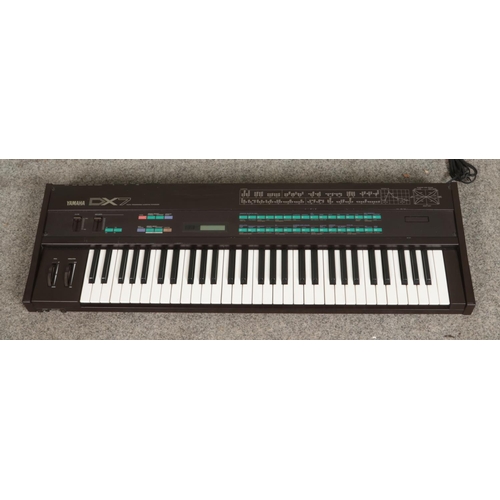 326 - A Yamaha DX7  Digital Programmable Algorithm synthesizer keyboard.