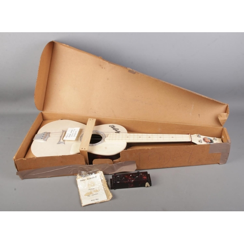 338 - A boxed Elvis Presley Auto-Chord Selco guitar with accessories.