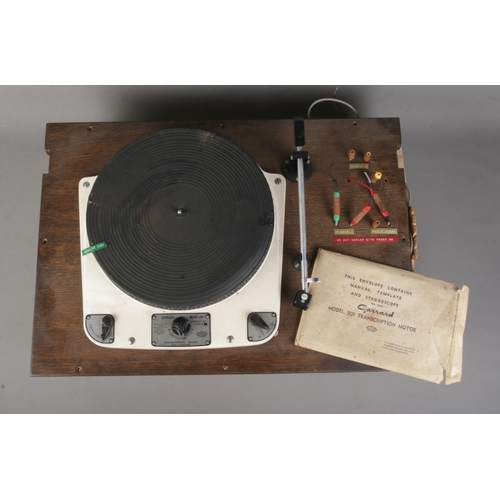 350 - A Garrard Model 301 transcription motor turntable with original instruction manual.