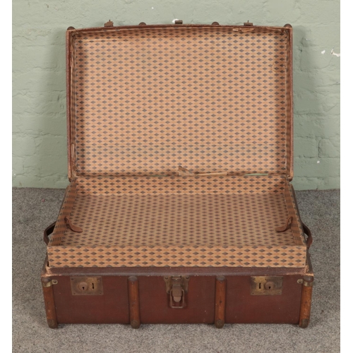 361 - A vintage wooden bound steamer trunk.