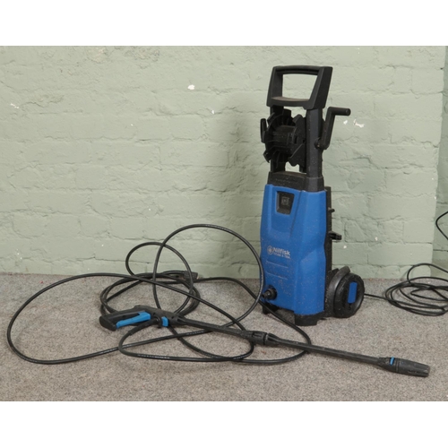 385 - A Nilfisk Titan X-Tra pressure washer.