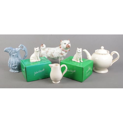 61 - A quantity of ceramics. Includes Victorian moulded jug, Meissen style pug, two boxed John Beswick fo... 