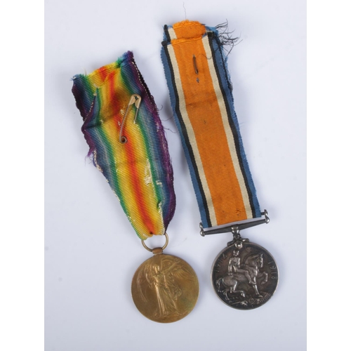 429 - A pair of WWI medals with ribbons to include Victory medal and silver British War medal. Both inscri... 