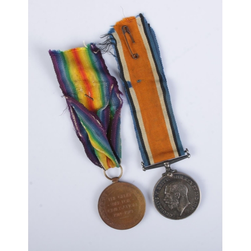 429 - A pair of WWI medals with ribbons to include Victory medal and silver British War medal. Both inscri... 