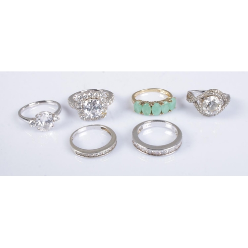 430 - Six silver rings mostly cubic zirconia set examples. Total weight 17.7g.